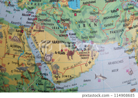 Globe close up. Map of continents - Arabian peninsula. An indispensable device for geography lessons. 114908685