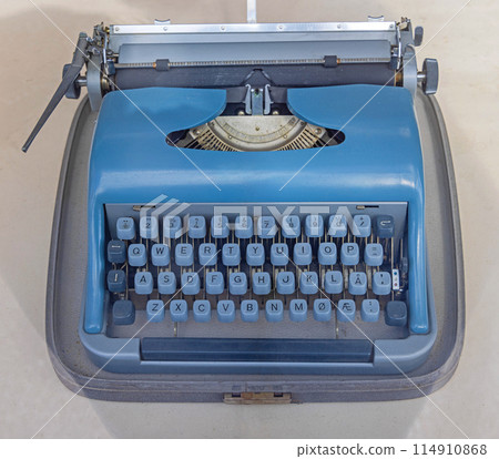 Blue Portable Typewriter Machine 114910868