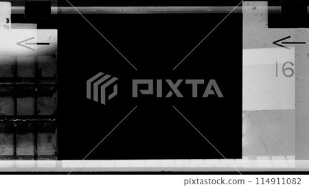 Empty 110mm film frames Or border strip dusty scratched scanned old film texture. 110mm films border with camera roll numbers and bezel vintage retro effect. Frame social stories filmstrips templates. 114911082