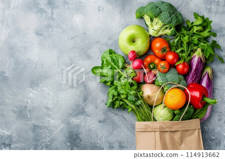 paper bag with fresh fruits and vegetables on light color background, 114913662