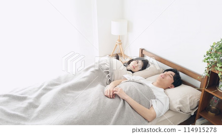 A woman worries about her husband's sleep apnea 114915278