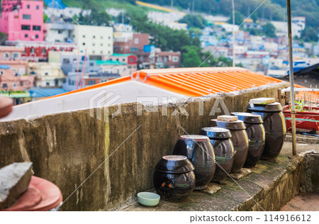 A kimchi jar placed beside the living passage at Gamcheon Culture Village, Busan A kimchi jar placed beside the living passage at Gamcheon Culture Village, Busan 114916612