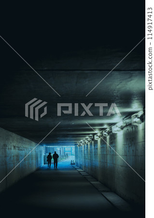 People walking under the underpass People walking under the underpass 114917413