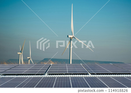 Solar cells and wind turbines produce electricity, clean energy. Solar cells and wind turbines produce electricity, clean energy. 114918826