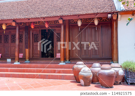 Courtyard and vases of Mia Pagoda, a temple in Duong Lam village designated as a national cultural asset in Hanoi, Vietnam 114921575