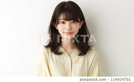A young woman looking at the camera 114924701