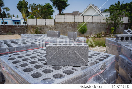 Concrete blocks with holes stacked on top of each other Concrete blocks with holes stacked on top of each other 114927918