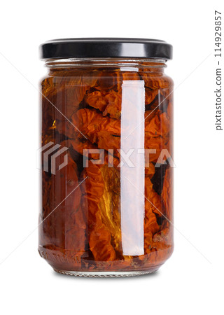 Sun-dried tomatoes in sunflower oil, antipasto in glass jar with screw cap. Whole tomatoes, air dried under the Italian sun, marinated and preserved in sunflower oil, vinegar, herbs, spices and salt. Sun-dried tomatoes in sunflower oil, antipasto in glass jar with screw cap. Whole tomatoes, air dried under the Italian sun, marinated and preserved in sunflower oil, vinegar, herbs, spices and salt. 114929857