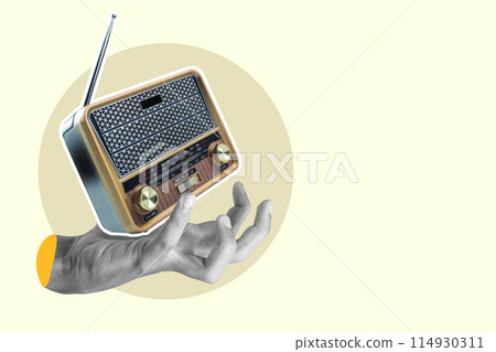 Hand holding vintage radio on abstract background Hand holding vintage radio on abstract background 114930311