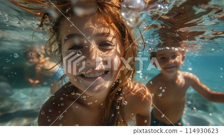 Group of Children Swimming in a Pool Group of Children Swimming in a Pool 114930623