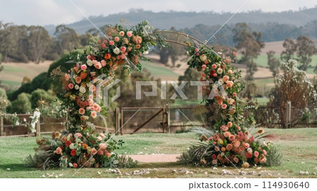 Wedding Arch Adorned With Flowers 114930640