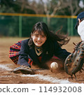Female students playing baseball in uniform 114932008