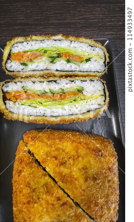 delicious fresh sushi burgers on a dark background for food delivery website delicious fresh sushi burgers on a dark background for food delivery website 114933497