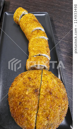 delicious fresh sushi burgers on a dark background for food delivery website delicious fresh sushi burgers on a dark background for food delivery website 114933498