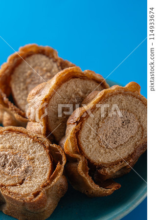 Sweet and delicious roll cake on a plate Sweet and delicious roll cake on a plate 114933674