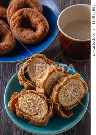 Sweet and delicious roll cake on a plate 114933695