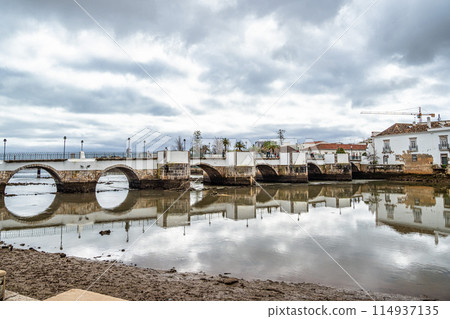 Roman bridge in Tavira, Algarve, Portugal. Ponte Romana bridge in Tavira town 114937135