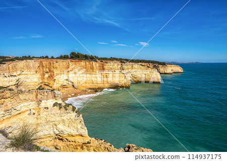 Portuguese coast in Benagil, Algarve, Portugal. Seven Hangging Valleys Trail. Portuguese coast in Benagil, Algarve, Portugal. Seven Hangging Valleys Trail. 114937175
