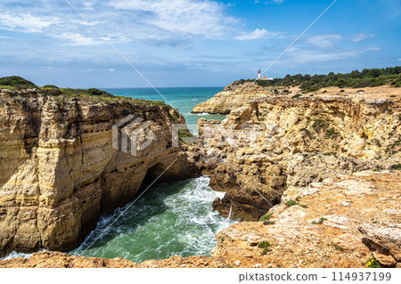 Portuguese coast in Benagil, Algarve, Portugal. Peninsula. Seven Hangging Valleys Trail. 114937199
