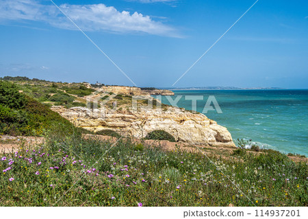 Portuguese coast in Benagil, Algarve, Portugal. Praia do Carvalho. Seven Hangging Valleys Trail. Portuguese coast in Benagil, Algarve, Portugal. Praia do Carvalho. Seven Hangging Valleys Trail. 114937201