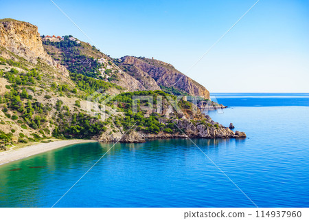 Spanish sea coast with tower, Andalusia 114937960