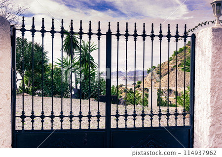 Gate on sea coast. 114937962