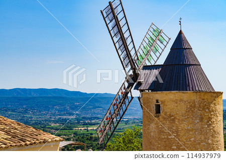 Wind mill in Saint-Saturnin-les-Apt village in France Wind mill in Saint-Saturnin-les-Apt village in France 114937979