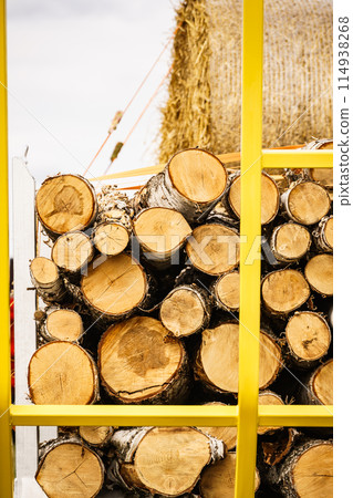 Pile of wood wooden logs on truck Pile of wood wooden logs on truck 114938268