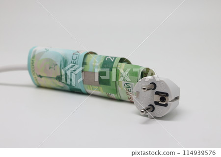 White electric cable and banknotes, expensive electricity, saving electricity. 114939576