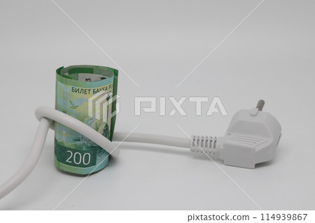 White electric cable and banknotes, expensive electricity, saving electricity. White electric cable and banknotes, expensive electricity, saving electricity. 114939867