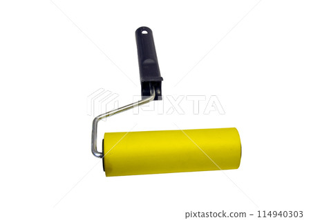 Yellow rubber paint roller on a white background Yellow rubber paint roller on a white background 114940303
