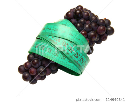 Tasty grape and measuring tape isolated on white background 114940841