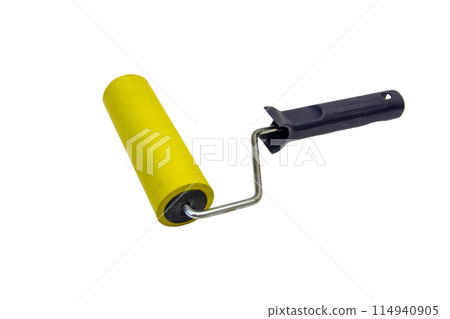 Yellow rubber paint roller on a white background 114940905