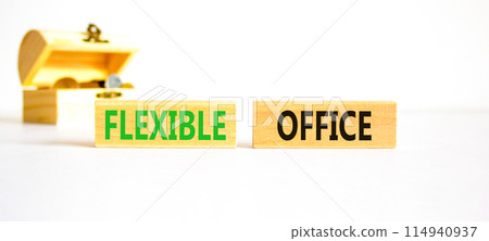 Flexible office symbol. Concept words Flexible office on beautiful wooden block. Beautiful white paper background. Wooden chest with coins. Business Flexible office concept. Copy space. 114940937