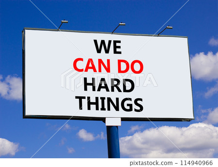 We can do hard things symbol. Concept words We can do hard things on beautiful billboard. Beautiful blue sky clouds background. Business, we can do hard things concept. Copy space. 114940966