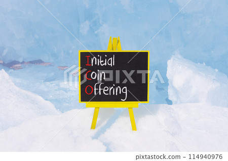 ICO initial coin offering symbol. Concept words ICO initial coin offering on beautiful yellow blackboard. Beautiful blue ice background. Business ICO initial coin offering concept. Copy space. ICO initial coin offering symbol. Concept words ICO initial coin offering on beautiful yellow blackboard. Beautiful blue ice background. Business ICO initial coin offering concept. Copy space. 114940976