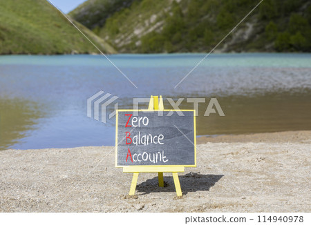 ZBA zero balance account symbol. Concept words ZBA zero balance account on beautiful yellow blackboard. Beautiful mountain lake background. Business ZBA zero balance account concept. Copy space. 114940978
