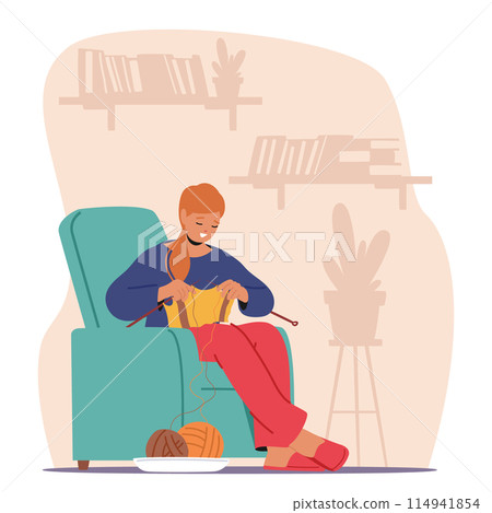 Young Woman Knitting A Sweater, Smiling As She Enjoys Her Hobby In A Cozy Living Room. She Sits Comfortably On Armchair 114941854