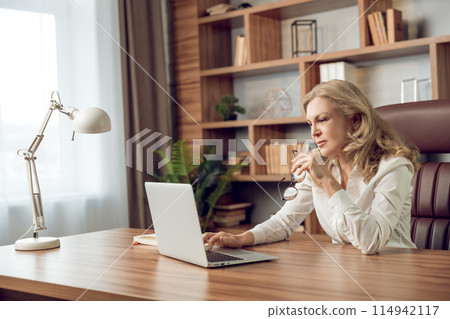 Woman psychologist providing online consultations for patient mental health support 114942117