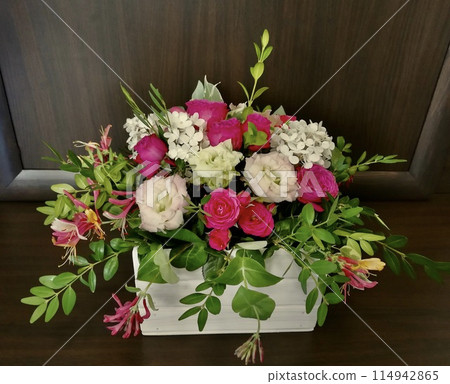 Flowers cute bouquet with roses and alstroemerias pink white green, wooden box 114942865