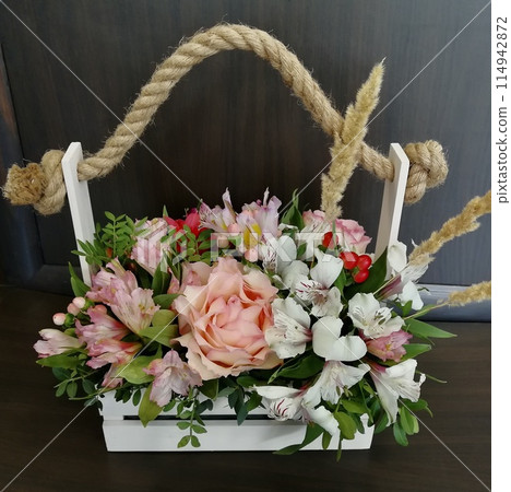 Flowers cute bouquet with roses and alstroemerias pink white green, wooden box Flowers cute bouquet with roses and alstroemerias pink white green, wooden box 114942872
