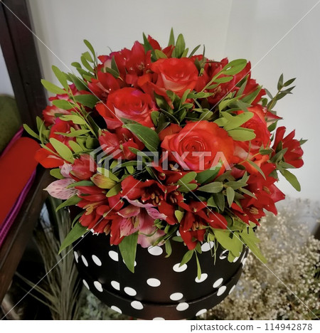 Flowers cute bouquet with roses and alstroemerias pink white green, wooden box Flowers cute bouquet with roses and alstroemerias pink white green, wooden box 114942878