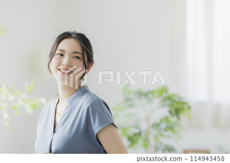 A woman with a laptop A woman with a laptop 114943458