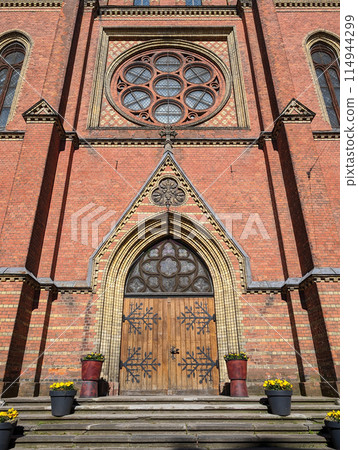 Entrance door to the old ancient Roman Catholic Church of St Francis, Riga, Latvia. 114944299