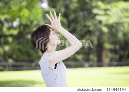 Young woman meditating outdoors Outdoor yoga image 114945194