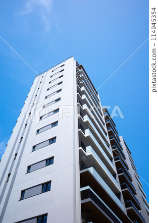 A newly built apartment building that stands out against the blue sky b-1 A newly built apartment building that stands out against the blue sky b-1 114945354