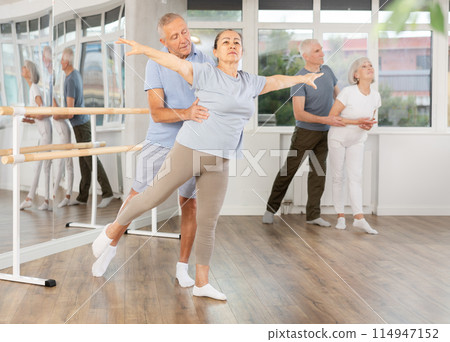 Ballet performed by elderly people in ballet studio Ballet performed by elderly people in ballet studio 114947152