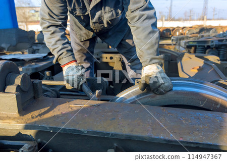 Railway car wheelsets were located on railway junction while waiting for repairs 114947367