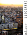 A city stained by the setting sun 114948332