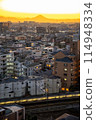 A city stained by the setting sun 114948334